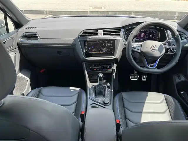 フォルクスワーゲン ティグアン R 富山県 2023(令5)年 0.6万km 青 ワンオーナー/4WD/寒冷地仕様/レーンチェンジアシストシステム/リヤトラフィックアラート/クリアランスソナー/パーキングアシスト/レーンキープアシスト/オートマチックハイビーム/パドルシフト/シートポジションメモリー/衝突軽減システム/ステアリングヒーター/純正SDナビ/Bluetooth/全方位カメラ/パワーシート　D+N席/ビルトインETC/純正AWスタッドレスタイヤ付4本あり