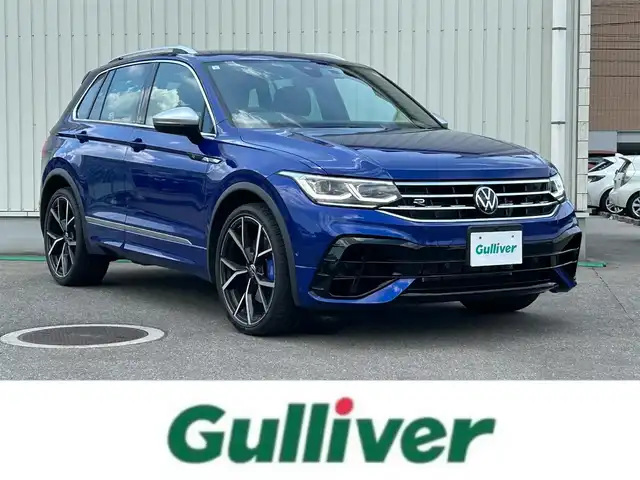 フォルクスワーゲン ティグアン R 富山県 2023(令5)年 0.6万km 青 ワンオーナー/4WD/寒冷地仕様/レーンチェンジアシストシステム/リヤトラフィックアラート/クリアランスソナー/パーキングアシスト/レーンキープアシスト/オートマチックハイビーム/パドルシフト/シートポジションメモリー/衝突軽減システム/ステアリングヒーター/純正SDナビ/Bluetooth/全方位カメラ/パワーシート　D+N席/ビルトインETC/純正AWスタッドレスタイヤ付4本あり