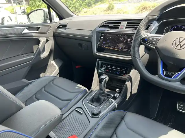 フォルクスワーゲン ティグアン R 富山県 2023(令5)年 0.6万km 青 ワンオーナー/4WD/寒冷地仕様/レーンチェンジアシストシステム/リヤトラフィックアラート/クリアランスソナー/パーキングアシスト/レーンキープアシスト/オートマチックハイビーム/パドルシフト/シートポジションメモリー/衝突軽減システム/ステアリングヒーター/純正SDナビ/Bluetooth/全方位カメラ/パワーシート　D+N席/ビルトインETC/純正AWスタッドレスタイヤ付4本あり
