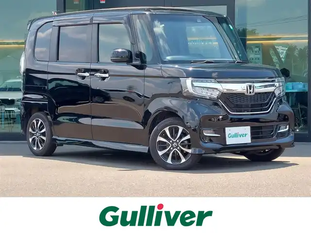 ホンダ Ｎ ＢＯＸ カスタム G L ホンダセンシング 東京都 2018(平30)年 3.2万km クリスタルブラックパール Honda SENSING/・衝突軽減ブレーキ/・誤発進抑制機能/・路外逸脱抑制機能/・アダプティブクルーズコントロール/・車線維持支援システム/・先行車発進お知らせ機能/・コーナーセンサー/プッシュスタート/純正ナビ(VXM-195VFi)/【CD/DVD/ipod/TV/FM/AM/SD/USB/BT/AUX】/バックカメラ/ビルトインETC/両側電動スライドドア/後席ロールサンシェード/LEDヘッドライト/オートライト/フォグランプ/ドアバイザー/14インチ純正アルミホイール/スマートキー