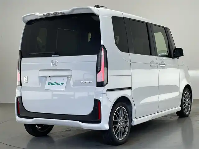 ホンダ Ｎ ＢＯＸ カスタム ターボ 愛知県 2025(令7)年 0.4万km プラチナホワイトパール 純正８型ナビ　バックカメラ　ＥＴＣ　禁煙車　純正前後ドラレコ　黒ハーフレザー　フルセグＴＶ　ホンダセンシング　衝突軽減　両側電動スライド　シートヒーター　誤発進抑制　追従クルコン　ＬＥＤオートライト　