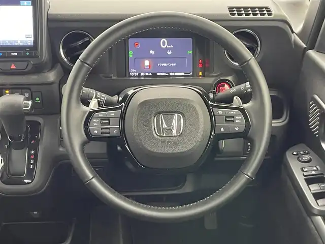 ホンダ Ｎ ＢＯＸ カスタム ターボ 愛知県 2025(令7)年 0.4万km プラチナホワイトパール 純正８型ナビ　バックカメラ　ＥＴＣ　禁煙車　純正前後ドラレコ　黒ハーフレザー　フルセグＴＶ　ホンダセンシング　衝突軽減　両側電動スライド　シートヒーター　誤発進抑制　追従クルコン　ＬＥＤオートライト　