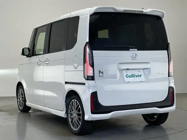ホンダ Ｎ ＢＯＸ カスタム ターボ 愛知県 2025(令7)年 0.4万km プラチナホワイトパール 純正８型ナビ　バックカメラ　ＥＴＣ　禁煙車　純正前後ドラレコ　黒ハーフレザー　フルセグＴＶ　ホンダセンシング　衝突軽減　両側電動スライド　シートヒーター　誤発進抑制　追従クルコン　ＬＥＤオートライト　