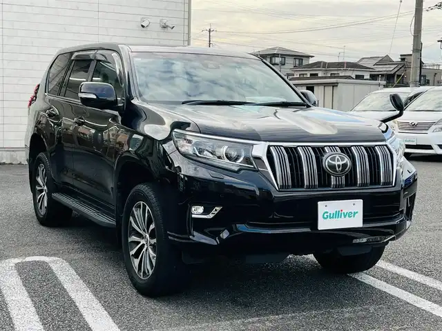トヨタ ランドクルーザー プラド TX Lパッケージ 大分県 2018(平30)年 6.5万km ブラック 純正19インチAW【MOP】/（切削光輝＋ダークグレーメタリック塗装）/純正ナビ(NSZT-W68T)/【フルセグTV/Bluetooth/DVD/CD/SD】/Toyota Safety Sense/・プリクラッシュセーフティ/・レーンディパーチャーアラート/・オートマチックハイビーム/・レーダークルーズコントロール/ヘッドライトウォッシャー/DN席シートベンチレーション/DN席快適温熱シート/DN席パワーシート/合成皮革シート/本革巻きシフトノブ＆パーキングブレーキレバー/バックカメラ/ETC/電動格納ミラー/ウィンカーミラー/プッシュスタート /スマートキー2本/保証書/取扱説明書