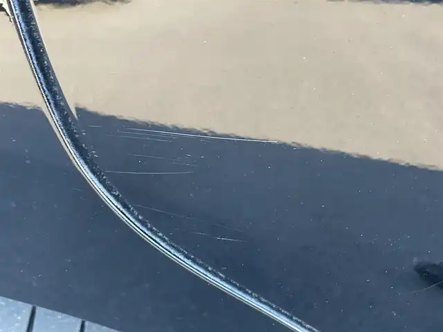 トヨタ エスクァイア Gi プレミアムパッケージ 岡山県 2019(令1)年 7.8万km ブラック 登録時走行距離 77825km/純正10インチナビ(NSZN-Z68T)/　(CD/DVD/フルセグTV/Bluetooth)/純正12.1インチフリップダウンモニター（V12T-R68C）/バックカメラ/衝突被害軽減システム/車線逸脱警報（レーンキープアシスト）/コーナーセンサー/ビルトインETC/両側パワースライドドア/ブラウンハーフレザーシート/シートヒーター（D・N席）/ステアリングヒーター/革巻きステアリング/ステアリングスイッチ/純正LEDヘッドライト/フォグライト/オートライト/オートマチックハイビーム/プッシュスタート/スマートキー/自動防眩式ルームミラー/MTモード付きAT/アイドリングストップ/純正アルミホイール 15インチ/ロールサンシェード/電動格納ミラー/オートリトラミラー/純正フロアマット車載/横滑防止装置/盗難防止装置/取扱説明書/新車時整備手帳（保証書）