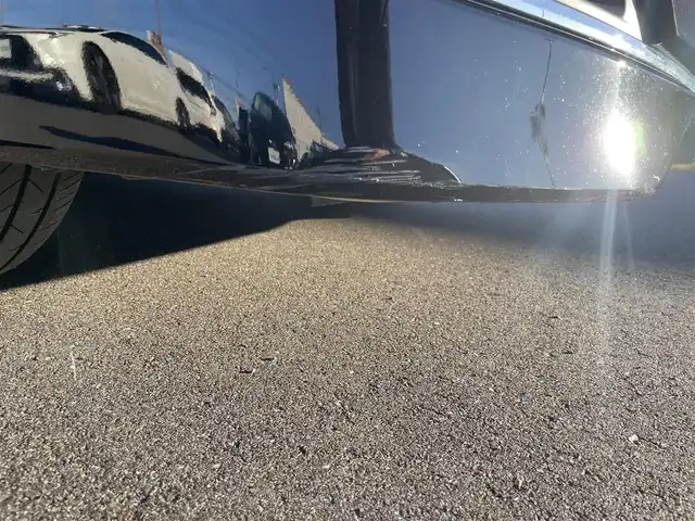 トヨタ エスクァイア Gi プレミアムパッケージ 岡山県 2019(令1)年 7.8万km ブラック 登録時走行距離 77825km/純正10インチナビ(NSZN-Z68T)/　(CD/DVD/フルセグTV/Bluetooth)/純正12.1インチフリップダウンモニター（V12T-R68C）/バックカメラ/衝突被害軽減システム/車線逸脱警報（レーンキープアシスト）/コーナーセンサー/ビルトインETC/両側パワースライドドア/ブラウンハーフレザーシート/シートヒーター（D・N席）/ステアリングヒーター/革巻きステアリング/ステアリングスイッチ/純正LEDヘッドライト/フォグライト/オートライト/オートマチックハイビーム/プッシュスタート/スマートキー/自動防眩式ルームミラー/MTモード付きAT/アイドリングストップ/純正アルミホイール 15インチ/ロールサンシェード/電動格納ミラー/オートリトラミラー/純正フロアマット車載/横滑防止装置/盗難防止装置/取扱説明書/新車時整備手帳（保証書）