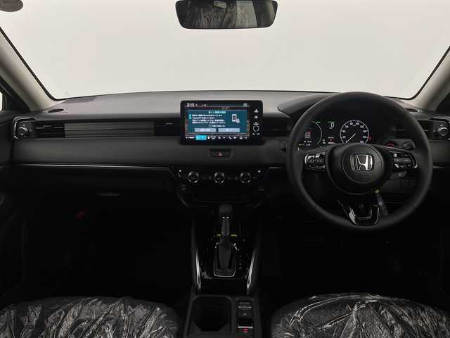 ホンダ ヴェゼル ハイブリッド e:HEV Z 新潟県 2025(令7)年 0.1千km クリスタルブラックパール ホンダセンシング/純正ナビ/　Bluetooth/フルセグTV/AndroidAuto/AppleCarPlay/バックカメラ/パワーバックドア/レーダークルーズコントロール/LEDオートライト/ハーフレザーシート/シートヒーター/純正18インチアルミホイール/パドルシフト/ブラインドスポットモニター/シーケンシャルウィンカー/ワイヤレス充電器/ステアリングヒーター