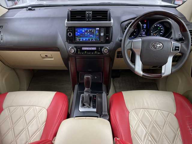 トヨタ ランドクルーザー プラド TX 岐阜県 2016(平28)年 11.7万km ホワイトパールクリスタルシャイン サンルーフ/モデリスタエアロ/シートカバー/トヨタセーフティセンス/・レーンディパーチャーアラート/・プリクラッシュセーフティ/カロッツェリアHDDナビ/（CD/DVD/フルセグ/Bluetooth/HDMI）/バックカメラ/オートLEDヘッドライト/前方ドライブレコーダー/ビルトインETC/スマートキー/スペアキー/電動格納ミラー/保証書/取扱説明書