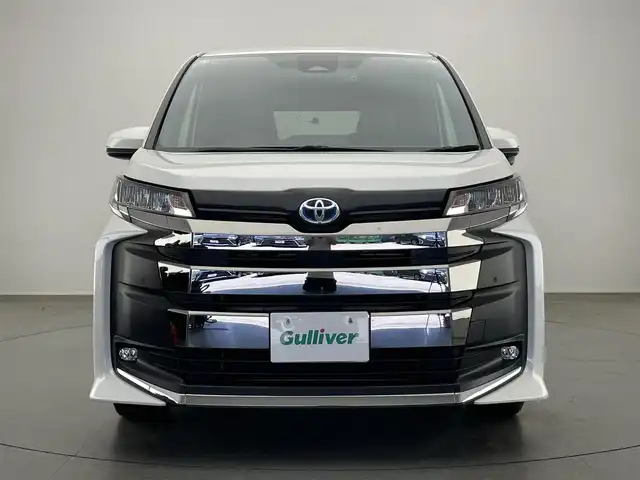 トヨタ ノア ハイブリッド S－Z 愛知県 2023(令5)年 6.7万km ホワイトパールクリスタルシャイン 純正１０．５型ナビ　純正１４型後席モニター　禁煙　バックカメラ　ＤＶＤ　フルセグ　セーフティセンス　ＡＣ１００Ｖ　ＨＤＭＩ　前後ドラレコ　ＥＴＣ２．０　シートヒーター　追従クルコン　衝突軽減　車線逸脱　両側パワースライドドア　純正フロアマット　LEDオートハイビーム　ハーフレザー