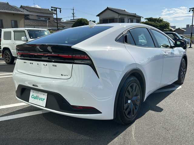 トヨタ プリウス X 岐阜県 2024(令6)年 0.6万km スーパーホワイトⅡ 登録時走行距離5891km/12.3インチSDナビ /フルセグTV /バックカメラ /ETC2.0 /100V充電 /LEDライト /オートライト /オートマチックハイビーム /寒冷地仕様 /スペアタイヤ /スマートキー /スペアキー /プッシュスタート/クルーズコントロール/Bluetooth接続/アイドリングストップ/レーンキープアシスト/横滑り防止装置/盗難防止装置