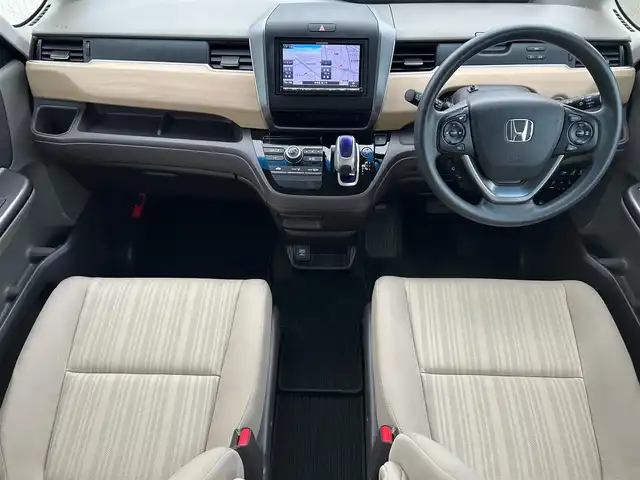 ホンダ フリード ハイブリット G ホンダセンシング 静岡県 2018(平30)年 5.7万km ブルーホライゾンM エンジンスタートボタン/パワーステアリング/パワーウィンドウ/寒冷地仕様/アイドリングストップ/スマートキー/オートエアコン/クルーズコントロール/純正ETC/バックカメラ/純正メモリナビ（CD/BT/ワンセグ）/ドライブレコーダー/3列シート/ウォークスルー/純正フロアマット/両側パワースライドドア/純正アルミホイール/ABS/横滑り防止装置/レーンキープアシスト/オートライト/LEDヘッドライト/Wエアバック/衝突軽減システム