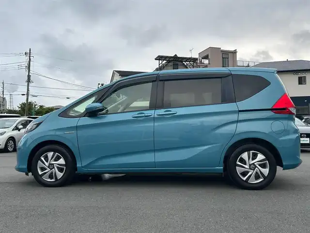 ホンダ フリード ハイブリット G ホンダセンシング 静岡県 2018(平30)年 5.7万km ブルーホライゾンM エンジンスタートボタン/パワーステアリング/パワーウィンドウ/寒冷地仕様/アイドリングストップ/スマートキー/オートエアコン/クルーズコントロール/純正ETC/バックカメラ/純正メモリナビ（CD/BT/ワンセグ）/ドライブレコーダー/3列シート/ウォークスルー/純正フロアマット/両側パワースライドドア/純正アルミホイール/ABS/横滑り防止装置/レーンキープアシスト/オートライト/LEDヘッドライト/Wエアバック/衝突軽減システム