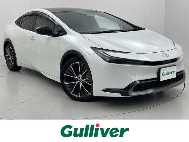 トヨタ プリウス Z 茨城県 2023(令5)年 3.3万km プラチナホワイトパールマイカ 純正12.3型DA/全周囲カメラ/フルセグ/パノラマルーフ/ワイヤレス充電/アドバンストパーク/衝突被害軽減ブレーキ/車線逸脱抑制装置/レーダークルーズコントロール/オートマチックハイビーム/クリアランスソナー/BSM/ETC2.0/ドラレコ/シートヒーター/ベンチレーション/ステアリングヒーター/純正19インチAW/LEDヘッドライト/スマートキー