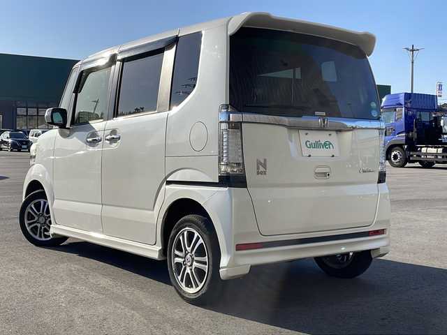ホンダ Ｎ ＢＯＸ カスタム G SSパッケージ 新潟県 2014(平26)年 9.6万km プレミアムホワイトパール 　純正ナビ/　ワンセグテレビ/　Bluetooth/DVD/　バックカメラ/　アイドリングストップ/　ウィンカーミラー/　ドアバイザー/　プッシュスタート/　両側パワースライドドア/　HIDヘッドライト/　オートライト/　ETC/　スマートキー/　電動格納ミラー