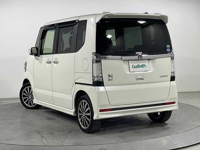 ホンダ Ｎ ＢＯＸ カスタム ターボ SSパッケージ 広島県 2015(平27)年 4.9万km プレミアムホワイトパール 純正ナビ　/両側パワースライドドア　/バックカメラ　/レーダークルーズコントロール　/衝突軽減ブレーキ　/オートライト　/HIDヘッドライト　/ETC　/純正フロアマット　/スマートキー　/純正15インチアルミホイール（165/55/R15)/エアバック（運転席/助手席/サイド）