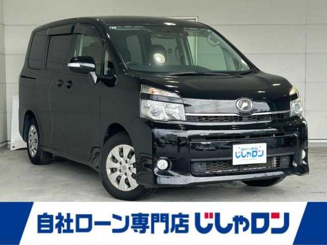 トヨタ ヴォクシー X Lエディション 沖縄県 2013(平25)年 6.6万km 黒 (株)IDOMが運営する【じしゃロンコザ店】の自社ローン専用車両になりますこちらは現金またはオートローンご利用時の価格です。自社ローンご希望の方は別途その旨お申付け下さい/純正ナビ/フルセグＴＶ/Ｂｌｕｅｔｏｏｔｈ接続/ＥＴＣ　　/バックカメラ/片側パワースライドドア　/リモコンキー/純正アルミホイール　/純正フロアマット　/オートライト　/キセノンヘッドライト　