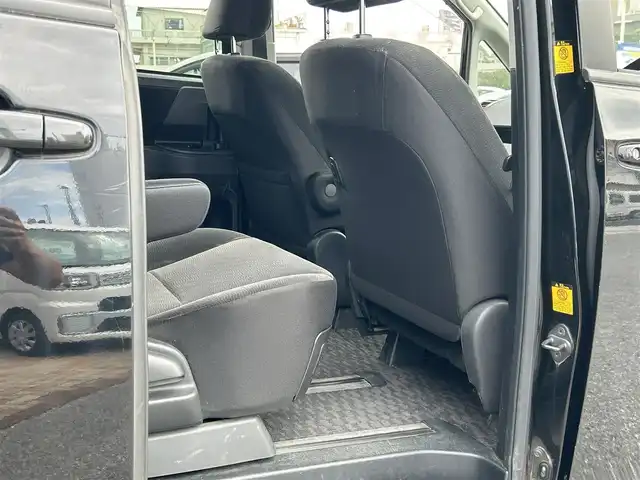 トヨタ ヴォクシー X Lエディション 沖縄県 2013(平25)年 6.6万km 黒 (株)IDOMが運営する【じしゃロンコザ店】の自社ローン専用車両になりますこちらは現金またはオートローンご利用時の価格です。自社ローンご希望の方は別途その旨お申付け下さい/純正ナビ/フルセグＴＶ/Ｂｌｕｅｔｏｏｔｈ接続/ＥＴＣ　　/バックカメラ/片側パワースライドドア　/リモコンキー/純正アルミホイール　/純正フロアマット　/オートライト　/キセノンヘッドライト　