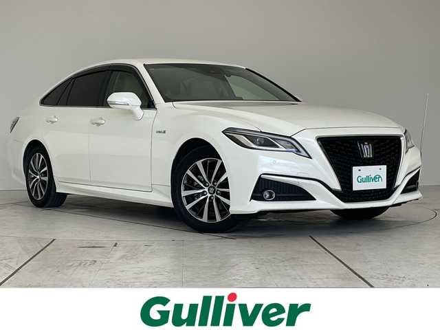 トヨタ クラウン ハイブリッド S Cパッケージ 愛知県 2018(平30)年 2.1万km ホワイトパールクリスタルシャイン トヨタセーフティセンス/純正8型ナビ/レーダークルーズコントロール/シートヒーター/バックカメラ/パワーシート/ヘッドアップディスプレイ/コーナーセンサー/純正アルミホイール/ブラインドスポットモニター/LEDヘッドライト/パドルシフト/オートマチックハイビーム/ドライブレコーダー/ETC/衝突軽減システム/フルセグ/CD/Bluetooth/ステアリングスイッチ/スマートキー/プッシュスタート