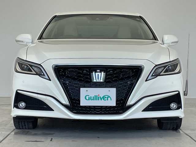 トヨタ クラウン ハイブリッド S Cパッケージ 愛知県 2018(平30)年 2.1万km ホワイトパールクリスタルシャイン トヨタセーフティセンス/純正8型ナビ/レーダークルーズコントロール/シートヒーター/バックカメラ/パワーシート/ヘッドアップディスプレイ/コーナーセンサー/純正アルミホイール/ブラインドスポットモニター/LEDヘッドライト/パドルシフト/オートマチックハイビーム/ドライブレコーダー/ETC/衝突軽減システム/フルセグ/CD/Bluetooth/ステアリングスイッチ/スマートキー/プッシュスタート