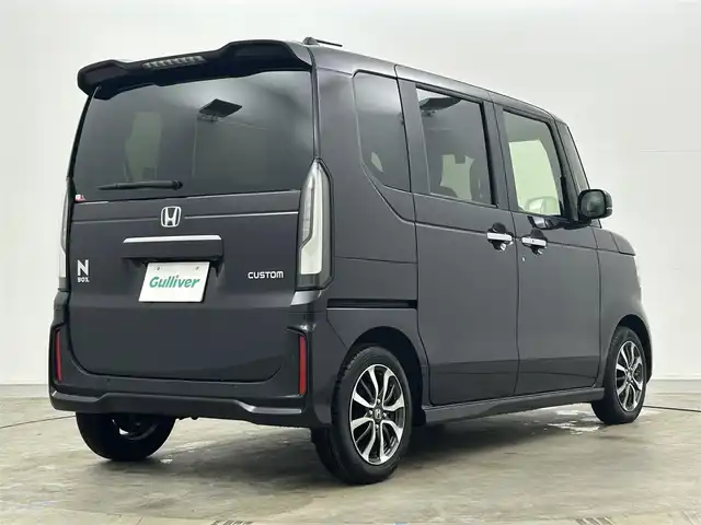ホンダ Ｎ ＢＯＸ カスタム 岡山県 2023(令5)年 0.2万km トワイライトミストブラックパール 純正9インチホンダコネクトナビ/LXU-242NBi/地デジ/Bluetooth/CD/DVD/カープレイ/マルチビューカメラ/両側パワースライドドア/シートヒーター/ホンダセンシング/アダプティブクルーズコントロール/LEDヘッドライト/プッシュスタート/スマートキー/純正前後ドラレコ/純正14インチアルミホイール/オートホールド/純正フロアマット/踏み間違え防止/オートライト