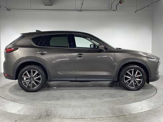 マツダ ＣＸ－５ XD Lパッケージ 神奈川県 2018(平30)年 5.1万km チタニウムフラッシュマイカ マツダコネクト7型SDナビゲーション/フルセグ　CD DVD　AM FM Bluetooth　USB　AUX/360度ビューモニター/BOSEサウンドシステム/電動リアゲート/アドバンストスマートシティブレーキサポート/後退時スマートシティブレーキサポート/誤発進抑制機能/スマートシティブレーキサポート/レーダークルーズコントロール/ブラインドスポットモニタリング/車線逸脱警報システム/レーンキープアシストシステム/リアパーキングセンサー/ドライバーアテンションアラート/オートハイビーム/標識認識システム/クリアランスソナー/アイドリングストップ/電子パーキング/オートホールド/革シート/全席シートヒーター/前席パワーシート