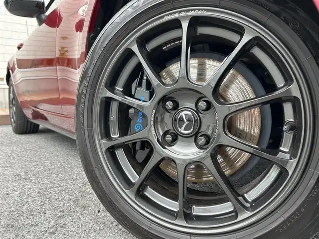 マツダ ロードスター 990S 滋賀県 2022(令4)年 1.5万km ソウルレッドクリスタルM ガソリン/2WD(FR)/6速MT/純正オーディオ/（AM/FM）/プリクラッシュブレーキアシスト	/ブラインド・スポット・モニタリング/ヒル・ローンチ・アシスト/ブレンボキャリパー/RAYS純正ホイール16インチ/ミラー一体型ドライブレコーダー/レーンキープアシスト/横滑り防止/リアコーナーセンサー/ステアリングスイッチ/オートライト/LEDヘッドライト/スマートキー/革巻きステアリング/パワーウィンドウ