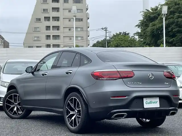 メルセデス・ベンツ Ｍ・ベンツ ＧＬＣ２２０ 東京都 2021(令3)年 2.6万km グレー 車体色　セレナイトグレーマグノ　297/ワンオーナー/マグノナイトエディション/12.3インチコックピットディスプレイ/純正ナビ/（フルセグ/BT/USB/FM/AM）/アダプティブクルーズコントロール/レンキープアシスト/ブラインドスポットモニター/全方位カメラ/パドルシフト/レザーシート/シートヒーター（D/N）/エアーシート（D/N）/パワーシート（D/N）/パワーバックドア/スマートキー×２/ETC2.0/純正２０インチアルミ