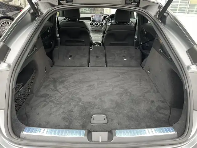 メルセデス・ベンツ Ｍ・ベンツ ＧＬＣ２２０ 東京都 2021(令3)年 2.6万km グレー 車体色　セレナイトグレーマグノ　297/ワンオーナー/マグノナイトエディション/12.3インチコックピットディスプレイ/純正ナビ/（フルセグ/BT/USB/FM/AM）/アダプティブクルーズコントロール/レンキープアシスト/ブラインドスポットモニター/全方位カメラ/パドルシフト/レザーシート/シートヒーター（D/N）/エアーシート（D/N）/パワーシート（D/N）/パワーバックドア/スマートキー×２/ETC2.0/純正２０インチアルミ