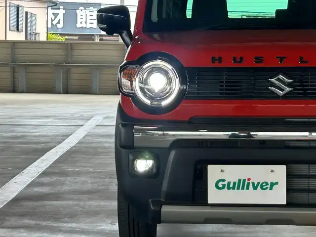 スズキ ハスラー タフワイルド・ターボ 静岡県 2024(令6)年 0.1万km未満 オレンジⅡ ツートーン/カラーコード：E73 A26/届出済未使用車/登録時走行距離12km/スズキセーフティサポート/ルーフレール/純正9型ナビ/フルセグTV/DVD再生/BTオーディオ/シートヒーター/オートハイビーム/純正15AW/アイドリングストップ/スマートキー/プッシュスタート/USB充電ポート