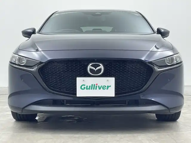 マツダ マツダ３ファストバック 15S ツーリング 三重県 2020(令2)年 2.6万km ディープクリスタルブルーマイカ 禁煙車/マツダコネクトナビ/　フルセグTV/DVD/USB/Bluetooth/全方位カメラ/デュアルオートAC/MTモード付きAT/革巻きステアリング/ステアリングスイッチ/レーダークルーズコントロール/PCS/LKA/BSM/オートハイビーム/前後コーナーセンサー/アイドリングストップ/ETC/純正LEDヘッドライト/サイド/カーテンエアバック