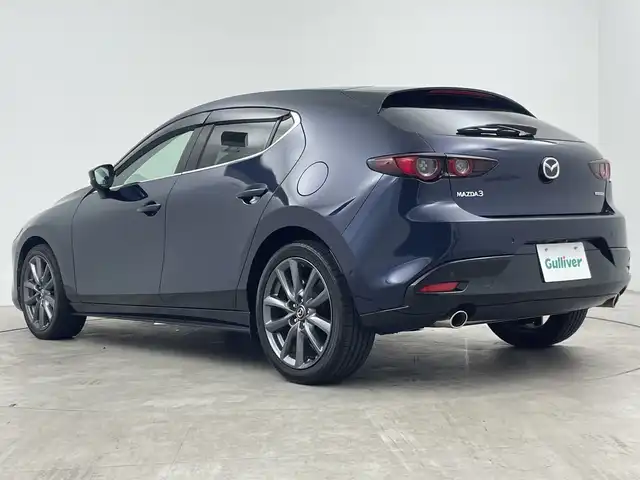 マツダ マツダ３ファストバック 15S ツーリング 三重県 2020(令2)年 2.6万km ディープクリスタルブルーマイカ 禁煙車/マツダコネクトナビ/　フルセグTV/DVD/USB/Bluetooth/全方位カメラ/デュアルオートAC/MTモード付きAT/革巻きステアリング/ステアリングスイッチ/レーダークルーズコントロール/PCS/LKA/BSM/オートハイビーム/前後コーナーセンサー/アイドリングストップ/ETC/純正LEDヘッドライト/サイド/カーテンエアバック