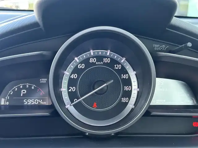 マツダ デミオ 13S 島根県 2015(平27)年 6万km チタニウムフラッシュマイカ 登録時走行距離59504km/純正ナビ（Bluetooth/AM/FM）/CD/DVDプレイヤー/地上デジタルTVチューナー(フルセグ)/バックカメラ/LEDヘッドランプ/オートライトシステム/フルオートエアコン/i-stop機能/ETC/ステアリングスイッチ/横滑り防止装置/衝突被害軽減ブレーキ/15インチ社外AW/ドアバイザー/プッシュスタート/スマートキー(スペアキー×1)