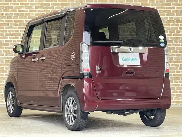 ホンダ Ｎ ＢＯＸ G SSパッケージ 岩手県 2013(平25)年 9.6万km プレミアムディープロッソパール ４WD/両側パワースライドドア/横滑り防止装置/アイドリングストップ/ヒーテッドドアミラー/運転席ハイトアジャスター/ヘッドライトレベライザー/ベンチシート/チップアップリアシート/ETC/エンジンスターター/スマートキーシステム/14インチアルミホイール
