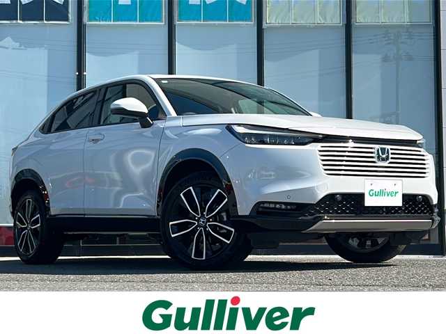 ホンダ ヴェゼル ハイブリッド e:HEV Z 山形県 2025(令7)年 0.1千km プラチナホワイトパール 4WD/ホンダセンシング/レーダークルーズコントロール/BSM/寒冷地仕様/前後コーナーセンサー/電動リアゲート/バックカメラ/純正コネクトディスプレイオーディオ/LEDオートライト/フォグランプ/オートマチックハイビーム/ハーフレザーシート/DN席シートヒーター/ステアリングスイッチ/ステアリングヒーター/パドルシフト/電動パーキングブレーキ/オートブレーキホールド/置くだけ充電/ビルトインETC2.0/純正AW/電動格納ウィンカーミラー/スマートキー