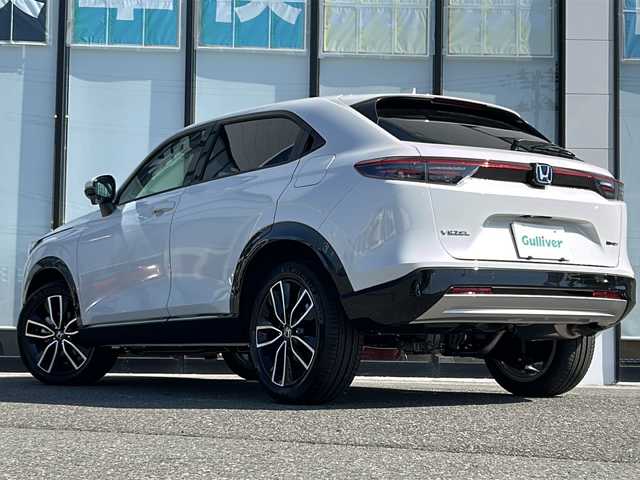 ホンダ ヴェゼル ハイブリッド e:HEV Z 山形県 2025(令7)年 0.1千km プラチナホワイトパール 4WD/ホンダセンシング/レーダークルーズコントロール/BSM/寒冷地仕様/前後コーナーセンサー/電動リアゲート/バックカメラ/純正コネクトディスプレイオーディオ/LEDオートライト/フォグランプ/オートマチックハイビーム/ハーフレザーシート/DN席シートヒーター/ステアリングスイッチ/ステアリングヒーター/パドルシフト/電動パーキングブレーキ/オートブレーキホールド/置くだけ充電/ビルトインETC2.0/純正AW/電動格納ウィンカーミラー/スマートキー