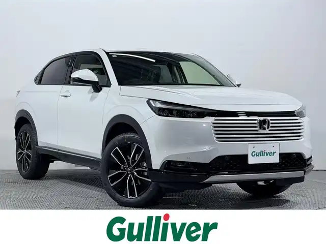ホンダ ヴェゼル ハイブリッド e:HEV Z 大阪府 2025(令7)年 0.1千km プラチナホワイトパール 純正ナビ /シートヒーター /ホンダセンシング/レーダークルコン　/コーナーセンサー　/レーンアシスト　/ＬＥＤヘッドライト　/電動リアゲート　/プッシュスタート　/ブラインドスポットモニター　/オートライト/オートエアコン/電格ミラー　/ハンドルヒーター