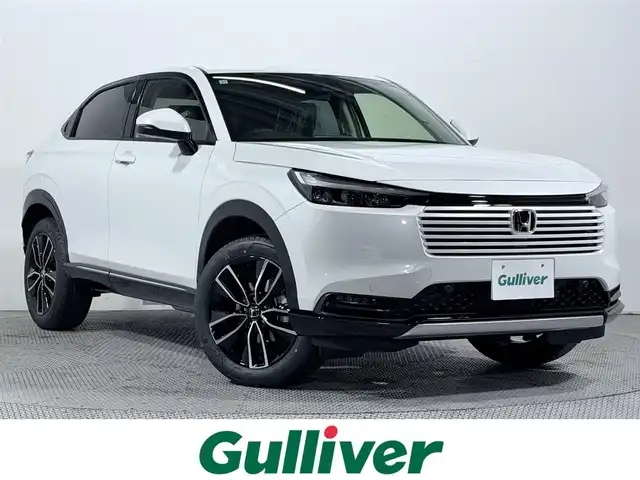 ホンダ ヴェゼル ハイブリッド e:HEV Z 大阪府 2025(令7)年 0.1千km プラチナホワイトパール 純正ナビ /シートヒーター /ホンダセンシング/レーダークルコン　/コーナーセンサー　/レーンアシスト　/ＬＥＤヘッドライト　/電動リアゲート　/プッシュスタート　/ブラインドスポットモニター　/オートライト/オートエアコン/電格ミラー　/ハンドルヒーター