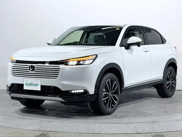 ホンダ ヴェゼル ハイブリッド e:HEV Z 大阪府 2025(令7)年 0.1千km プラチナホワイトパール 純正ナビ /シートヒーター /ホンダセンシング/レーダークルコン　/コーナーセンサー　/レーンアシスト　/ＬＥＤヘッドライト　/電動リアゲート　/プッシュスタート　/ブラインドスポットモニター　/オートライト/オートエアコン/電格ミラー　/ハンドルヒーター