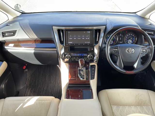 トヨタ アルファードハイブリット G 岩手県 2016(平28)年 2.9万km ブラック 9型ナビ バックC 電動リアゲート 両側電動スライドドア フルセグ DVD再生 メモリ付電動シート レーダークルーズコントロール AC100Vコンセント ビルドインETC オットマン 純正17インチAW オートLEDライト フォグ