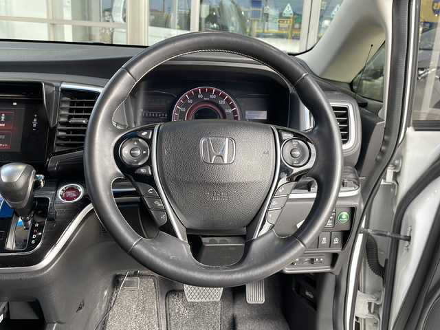 ホンダ オデッセイ アブソルート EX 静岡県 2014(平26)年 8.3万km ホワイトオーキッドパール 純正メモリナビ/・CD/・DVD/・フルセグＴＶ/・Bluetooth/・USB/・AM/・FM/主要装備/・両側パワスラ/・後席モニター/・衝突軽減/・レーンキープ/・クルコン/・BSM/・バックカメラ/・ETC/・ドラレコ/・TVキャンセラー/・ハーフレザーシート/・ヒーテッドドアミラー/・ステリモ/・LEDヘッドライト/・オートライト/・フォグランプ/・社外フロアマット/・社外アルミホイール