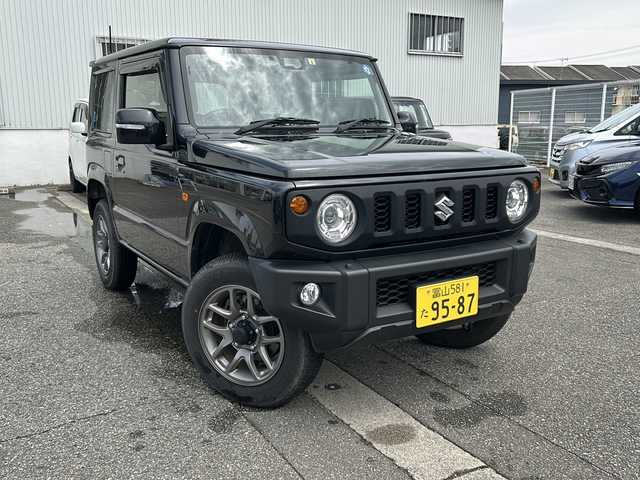 スズキ ジムニー XC 富山県 2022(令4)年 2.4万km ブルーイッシュブラックパール3 ワンオーナー/９インチ社外メモリナビ（X9NXL）/フルセグテレビ/アイドリングストップ/ウィンカーミラー/サイドミラーウォッシャー/サイドミラーヒーター/クルーズコントロール/ドアバイザー/プッシュスタート/スマートキー/ETC/LEDヘッドライト/フォグランプ/衝突軽減/車線逸脱警報/シートヒーター/オートライト/オートハイビーム/Bluetooth/純正フロアマット/ドアバイザー/保証書・取説・ナビ取説/スペアキー（スマートキー）