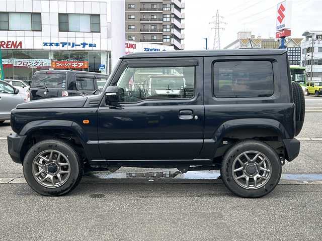スズキ ジムニー XC 富山県 2022(令4)年 2.4万km ブルーイッシュブラックパール3 ワンオーナー/９インチ社外メモリナビ（X9NXL）/フルセグテレビ/アイドリングストップ/ウィンカーミラー/サイドミラーウォッシャー/サイドミラーヒーター/クルーズコントロール/ドアバイザー/プッシュスタート/スマートキー/ETC/LEDヘッドライト/フォグランプ/衝突軽減/車線逸脱警報/シートヒーター/オートライト/オートハイビーム/Bluetooth/純正フロアマット/ドアバイザー/保証書・取説・ナビ取説/スペアキー（スマートキー）
