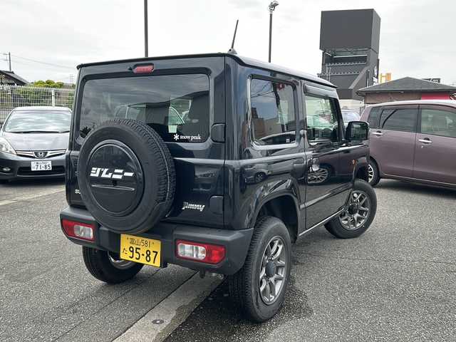 スズキ ジムニー XC 富山県 2022(令4)年 2.4万km ブルーイッシュブラックパール3 ワンオーナー/９インチ社外メモリナビ（X9NXL）/フルセグテレビ/アイドリングストップ/ウィンカーミラー/サイドミラーウォッシャー/サイドミラーヒーター/クルーズコントロール/ドアバイザー/プッシュスタート/スマートキー/ETC/LEDヘッドライト/フォグランプ/衝突軽減/車線逸脱警報/シートヒーター/オートライト/オートハイビーム/Bluetooth/純正フロアマット/ドアバイザー/保証書・取説・ナビ取説/スペアキー（スマートキー）