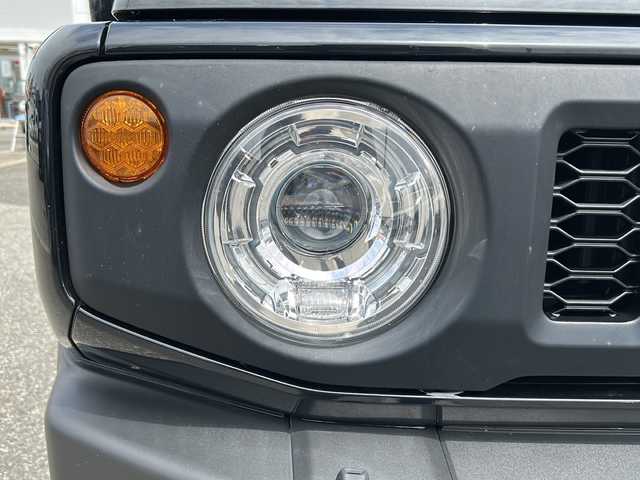 スズキ ジムニー XC 富山県 2022(令4)年 2.4万km ブルーイッシュブラックパール3 ワンオーナー/９インチ社外メモリナビ（X9NXL）/フルセグテレビ/アイドリングストップ/ウィンカーミラー/サイドミラーウォッシャー/サイドミラーヒーター/クルーズコントロール/ドアバイザー/プッシュスタート/スマートキー/ETC/LEDヘッドライト/フォグランプ/衝突軽減/車線逸脱警報/シートヒーター/オートライト/オートハイビーム/Bluetooth/純正フロアマット/ドアバイザー/保証書・取説・ナビ取説/スペアキー（スマートキー）