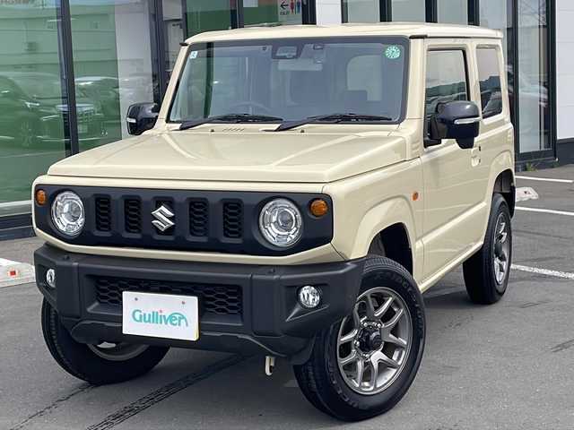 スズキ ジムニー XC 道東・釧路十勝 2024(令6)年 0.8万km シフォンアイボリーM ・４WD/・社外ディスプレイオーディオ/（CD・DVD・USB・BT・AM・FM）/・バックカメラ/・ETC/・前後ドライブレコーダー/・前席シートヒーター/・衝突被害軽減ブレーキ/・車線逸脱防止機能/・アイドリングストップ/・クルーズコントロール/・ステアリングスイッチ/・スマートキー/・プッシュスタート/・横滑り防止装置/・ダウンヒルアシスト/・社外フロアマット/・LEDヘッドライト/・フロントフォグライト/・純正アルミホイール/・保証書