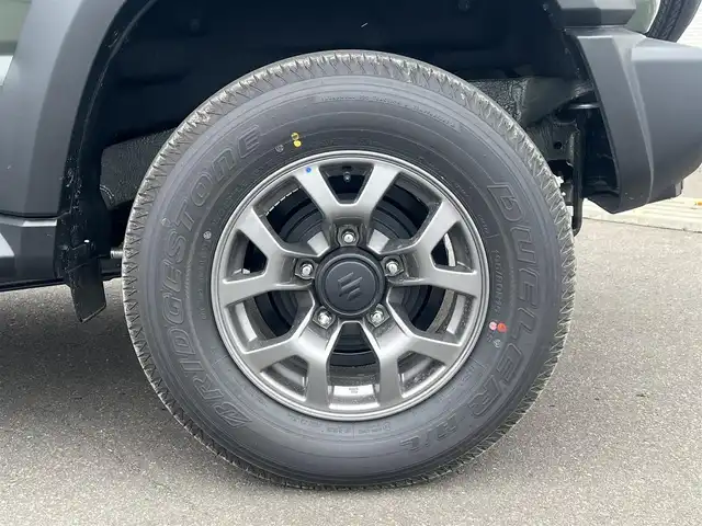 スズキ ジムニー ノマド FC 秋田県 2025(令7)年 0.1万km 緑 ４WD/衝突軽減システム/LEDヘッドライト/純正アルミ/スマートキー/アイドリングストップ/プッシュスタート/レーンキープアシスト/ダウンヒルアシストコントロール/クルーズコントロール/オートマチックハイビーム/ステアリングスイッチ/前席シートヒーター/純正フロアマット/純正ドアバイザー/オートライト/オートエアコン/パワーステアリング/パワーウィンドウ/ヘッドライトウォッシャー/ミラーヒーター/横滑り防止/レベライザー/電動格納ウィンカーミラー/保証書/取扱説明書/記録簿