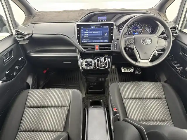 トヨタ ノア ハイブリッド Si 愛知県 2020(令2)年 1.9万km ホワイトパールクリスタルシャイン ディーラーオプション10インチTコネクトナビ/　　・Bluetooth対応/フルセグTV/HDMI/ドライブレコーダー/ビルトインETC/純正12.1インチ後席フリップダウンモニター/シートヒーター（前席）/キャプテンシート/社外ラバーマット/片側パワースライドドア（左側）/純正リヤスポイラー/純正16インチアルミホイール/LEDヘッドライト/社外ドアミラーガーニッシュ/クリアランスソナー/プリクラッシュセーフティ/クルーズコントロール/レーンキープアシスト/取扱説明書/保証書/スペアキー