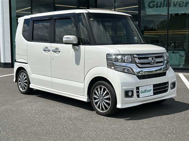 ホンダ Ｎ ＢＯＸ カスタム G ターボ Lパッケージ 鹿児島県 2016(平28)年 4.4万km プレミアムホワイトパールⅡ コーナーセンサー/衝突被害軽減システム/社外ナビ/Bluetooth/CD/DVD/フルセグ/バックカメラ/ドライブレコーダー/両側パワースライドドア/クルーズコントロール/LEDオートライト/ハーフレザー/純正15インチアルミホイール/アイドリングストップ/スマートキー/ETC
