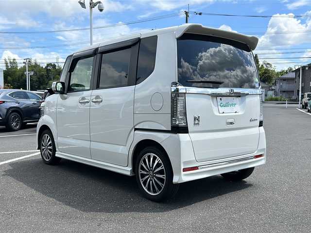 ホンダ Ｎ ＢＯＸ カスタム G ターボ Lパッケージ 鹿児島県 2016(平28)年 4.4万km プレミアムホワイトパールⅡ コーナーセンサー/衝突被害軽減システム/社外ナビ/Bluetooth/CD/DVD/フルセグ/バックカメラ/ドライブレコーダー/両側パワースライドドア/クルーズコントロール/LEDオートライト/ハーフレザー/純正15インチアルミホイール/アイドリングストップ/スマートキー/ETC