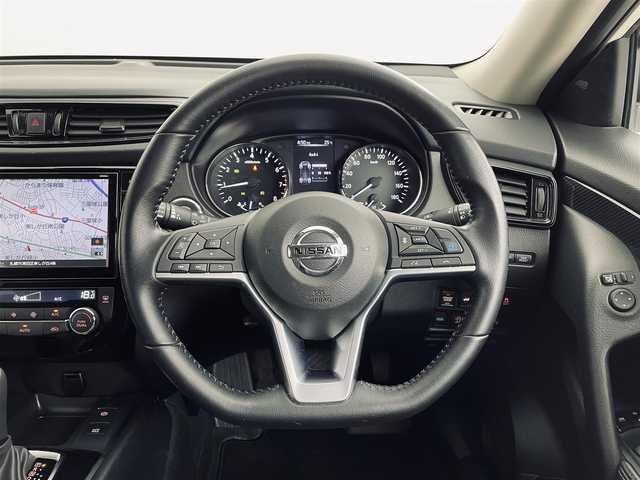 日産 エクストレイル 20Xi Vセレクション 道央・札幌 2022(令4)年 1.9万km ブリリアントホワイトパール ・4WD/・ワンオーナー/・NISMO製エアロ（FリップSRアンダー）/・NISMO製スポーツマフラー/・純正18inchブラックAW/・純正SDナビ（MM320D-L）/　CD/DVD/SD/Bt/USB/iPod/AUX/フルセグ/・アラウンドビューモニター/・プロパイロット/・エマージェンシーブレーキ/・車線、後側方車両検知警報/・クロストラフィック/・カプロンシート/・シートヒーター（全席）/・パワーシート（D/N）/・LEDヘッドライト/・オートハイビーム/・オートライト/・コーナーセンサー（F/R）/・デジタルインナーミラー/・オートブレーキホールド/・ビルトインETC/・社外前後ドライブレコーダー（CS-91FH）/・スマートキー/・プッシュスタート/・純正エンジンスターター/・社外AWスタッドレス積込/（’22 40週目製造 DM-V3 225/60R18）/・保証書、取説（有）/・スペアキーｘ１